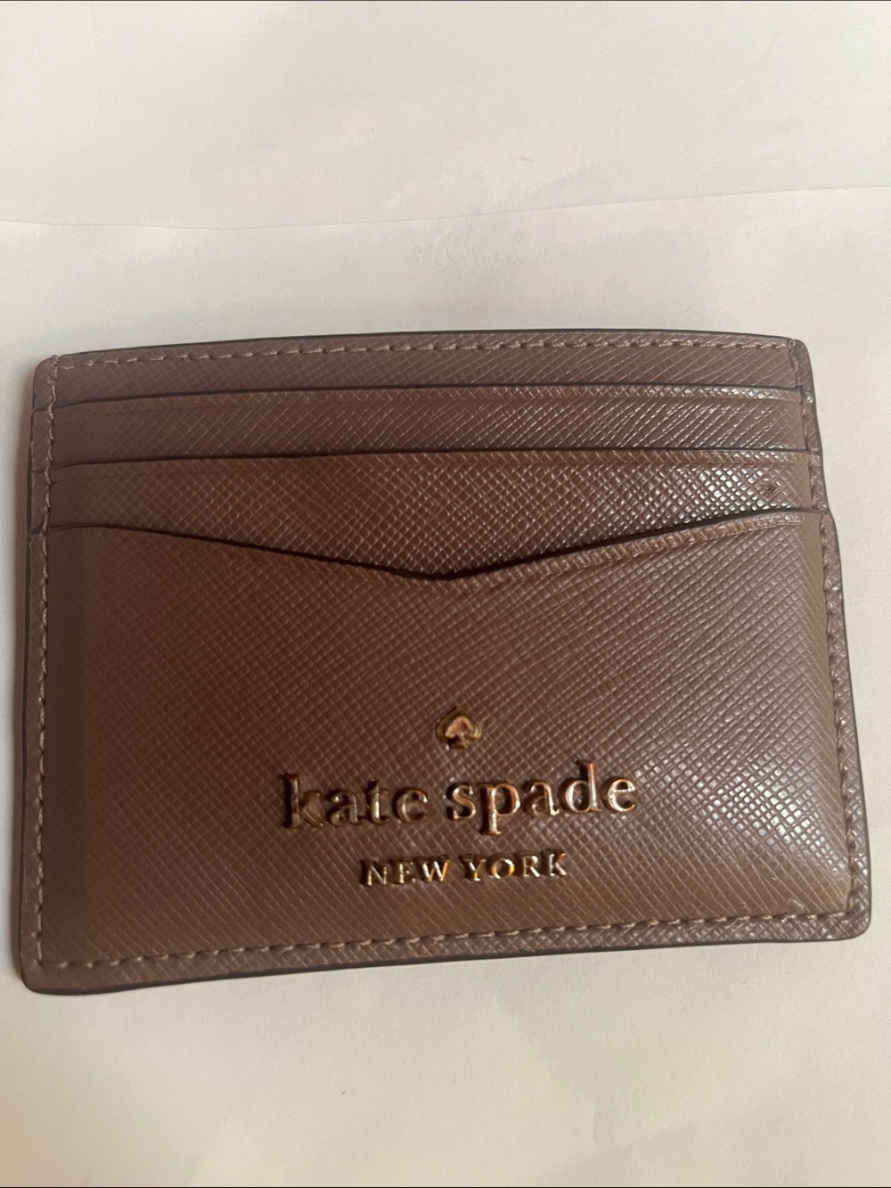 kate spade Brown Leather Card Sleeve with Gold Logo